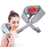 Masajeador eléctrico de cuello y espalda en color gris con panel de control y zona de calor infrarrojo visible, mostrado en uso sobre hombros y en vista frontal.