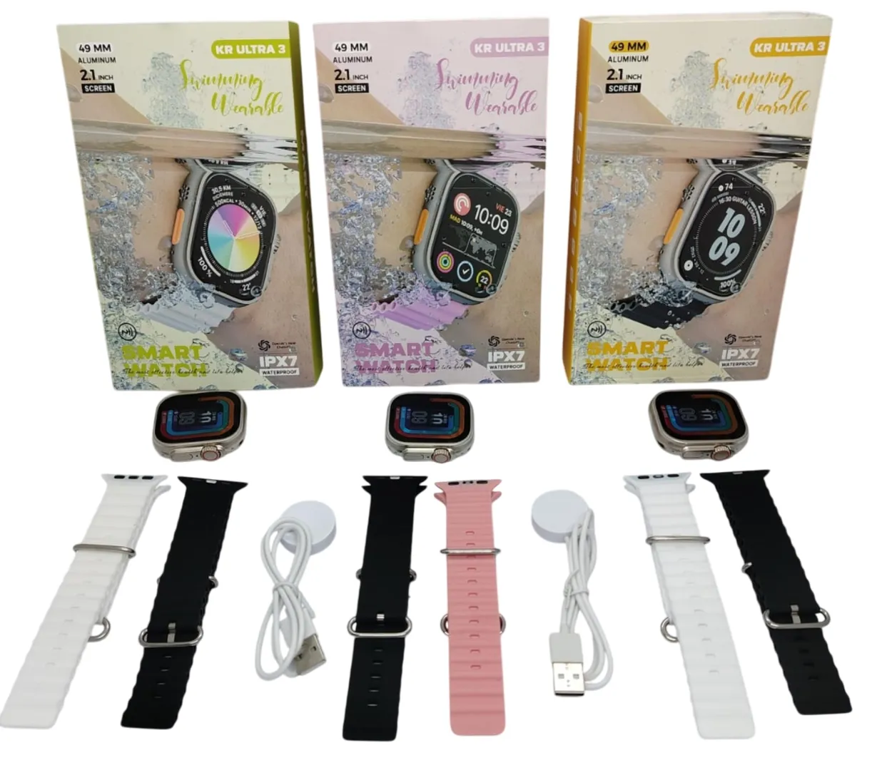 Tres cajas del reloj inteligente KR Ultra 49 mm con pantalla de 2.1 pulgadas, mostrando variantes de color y accesorios incluidos: correa blanca, negra y rosa, junto con cargador y cable USB.