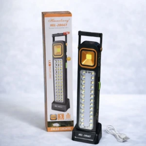 Lámpara LED recargable multifuncional modelo HE2-28667, con foco COB frontal y tira lateral de luces, junto a su caja original y cable USB.