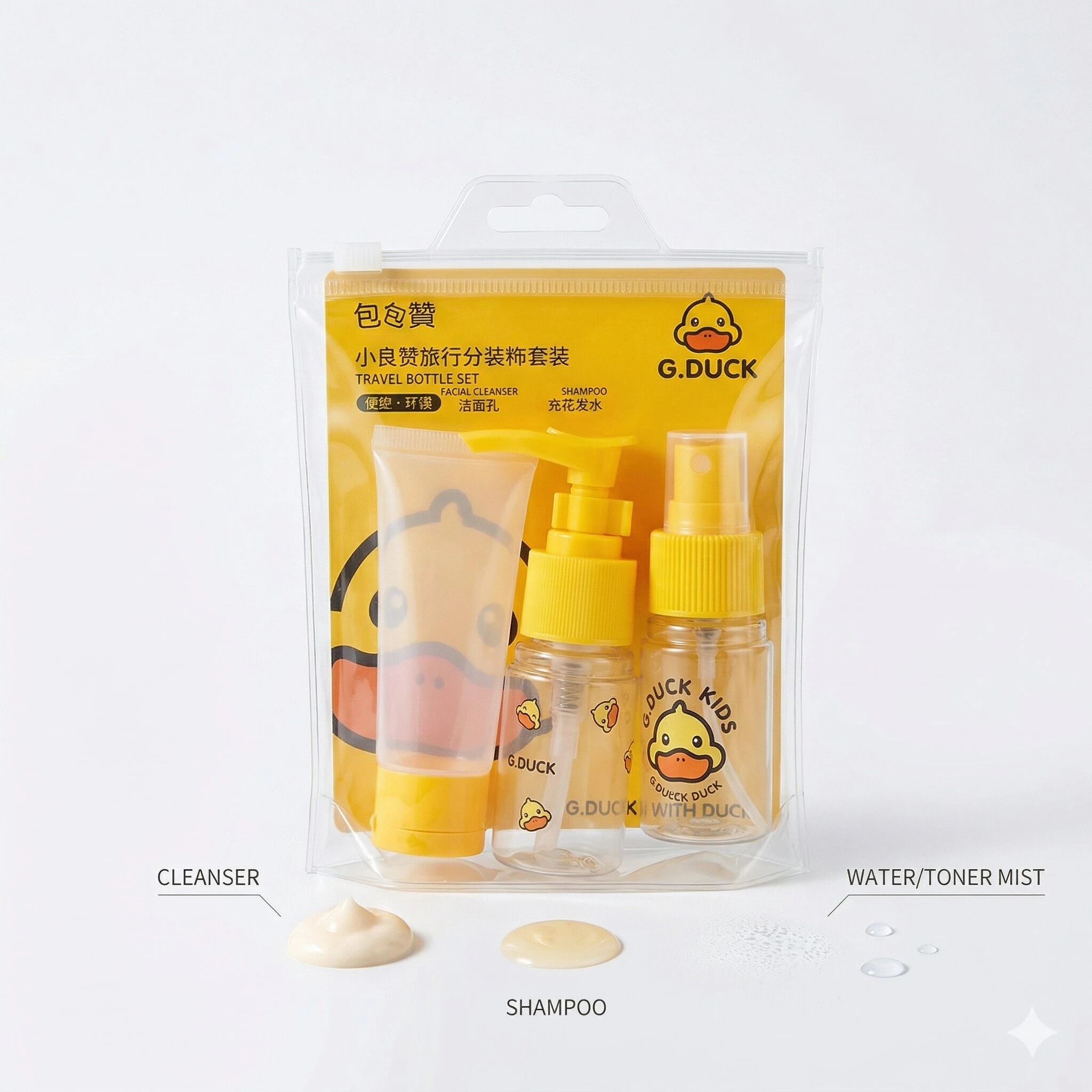 Pack de viaje G.Duck Kids con tres frascos amarillos de aseo personal, incluyendo limpiador, champú y spray, presentados en empaque transparente con de pato.