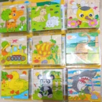 Rompecabezas infantil en madera con nueve diseños completos: animales, vehículos y naturaleza, ideales para estimular la concentración y motricidad fina.