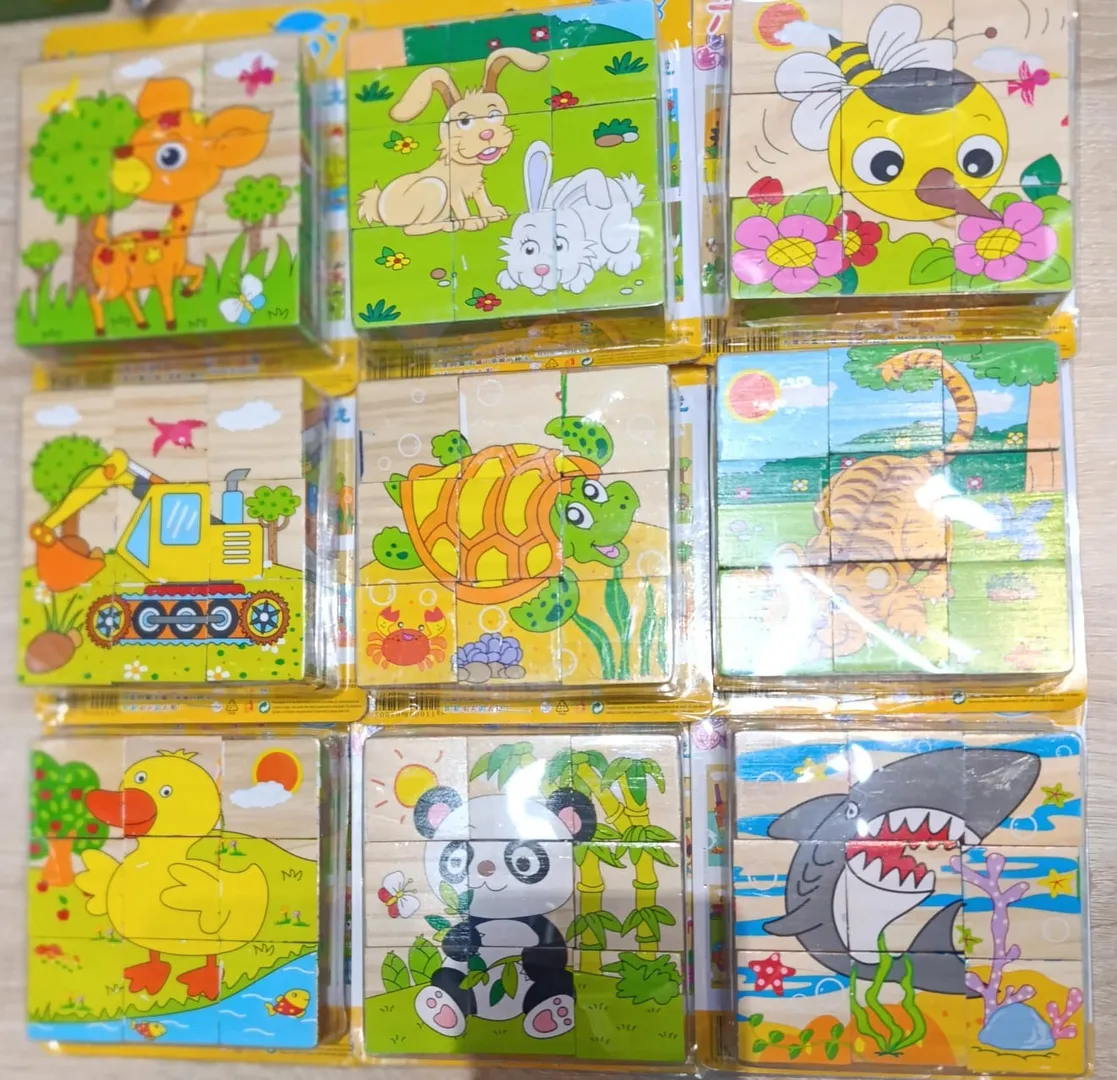 Rompecabezas infantil en madera con nueve diseños completos: animales, vehículos y naturaleza, ideales para estimular la concentración y motricidad fina.