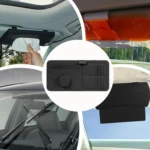 Organizador negro para visera de carro, con compartimentos para documentos y dinero, mostrando instalación y detalles de su diseño funcional.