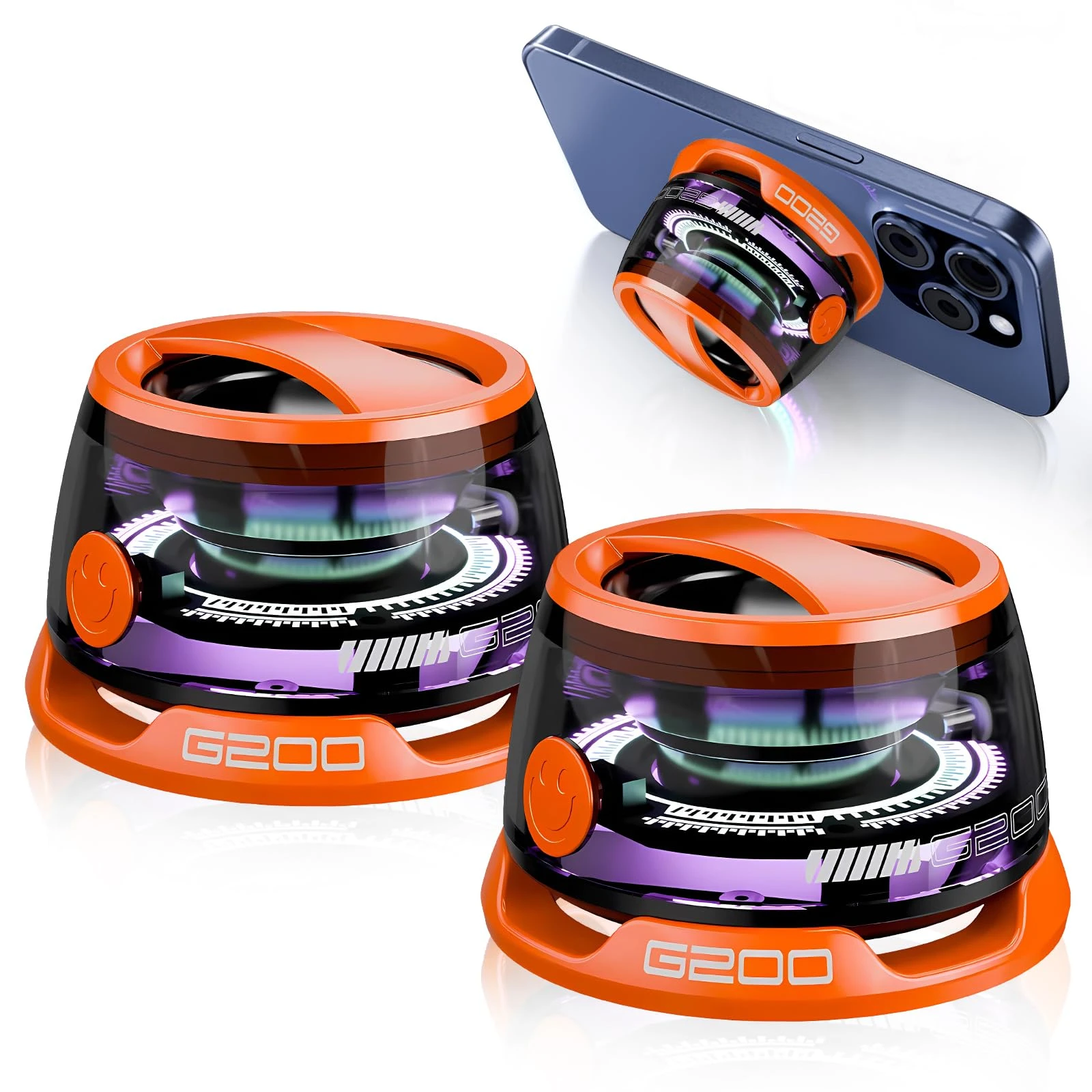 Set de dos parlantes portátiles G200 en naranja con iluminación RGB, mostrando unidad montada en smartphone azul sobre superficie metálica.