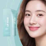 Pack de dos mascarillas para labios en envase verde menta, con tubo y caja mostrando nombre del producto y logotipo de labios.