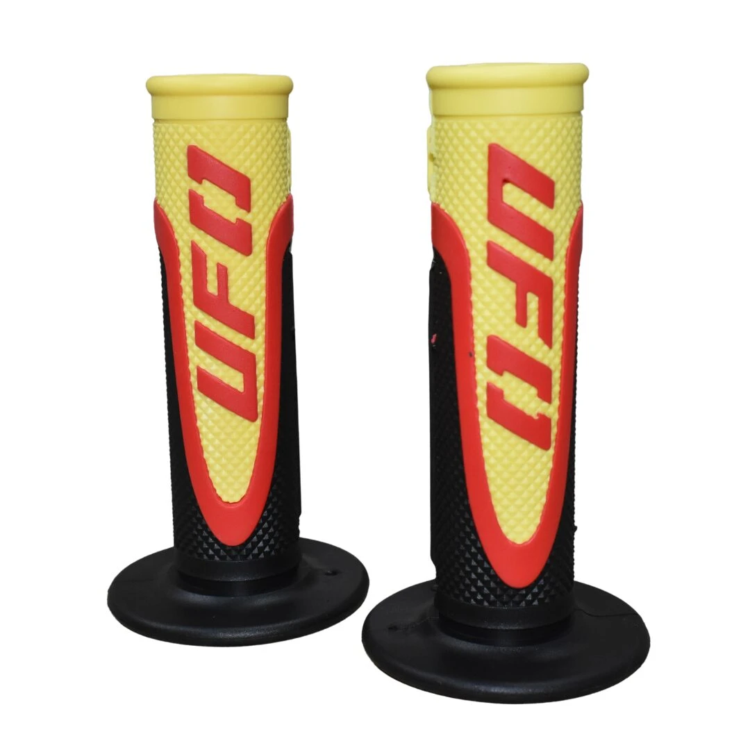 Grips UFO Control Tech para motocross, color amarillo con detalles rojos y negro, textura antideslizante y base circular.