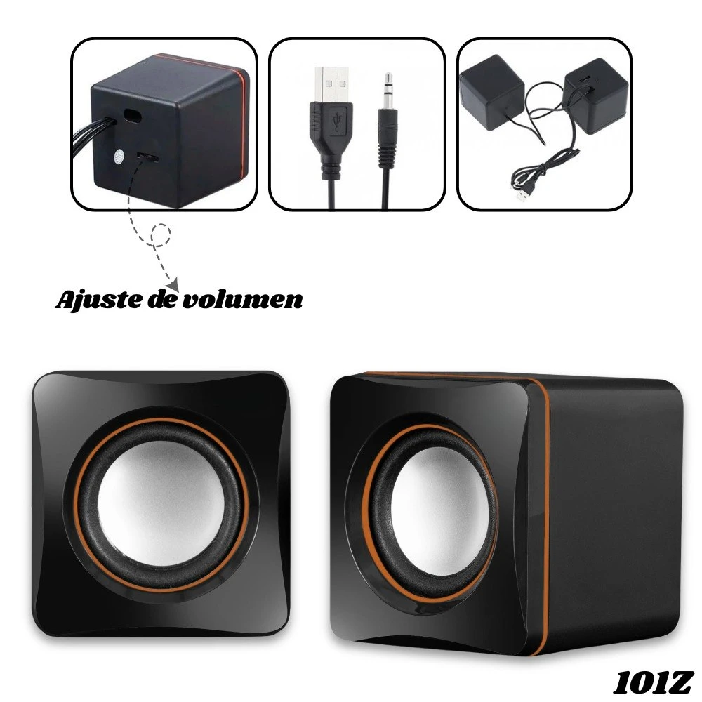Parlantes PC 101Z en negro con detalles naranjas, mostrando conectores USB y 3.5mm, adaptador de corriente y ajuste de volumen.