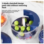 Peladora automática de frutas con diseño de 5 cuchillas en acero inoxidable, color azul oscuro, mostrando uvas verdes dentro del recipiente transparente.