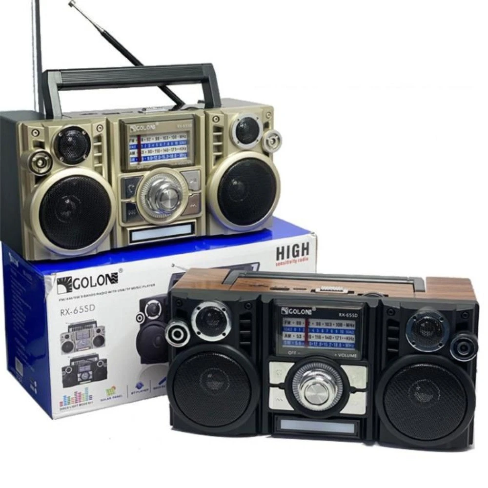 Radio parlante retro RX-65SD en color beige con panel solar y antenas telescópicas, acompañado de su caja original.
