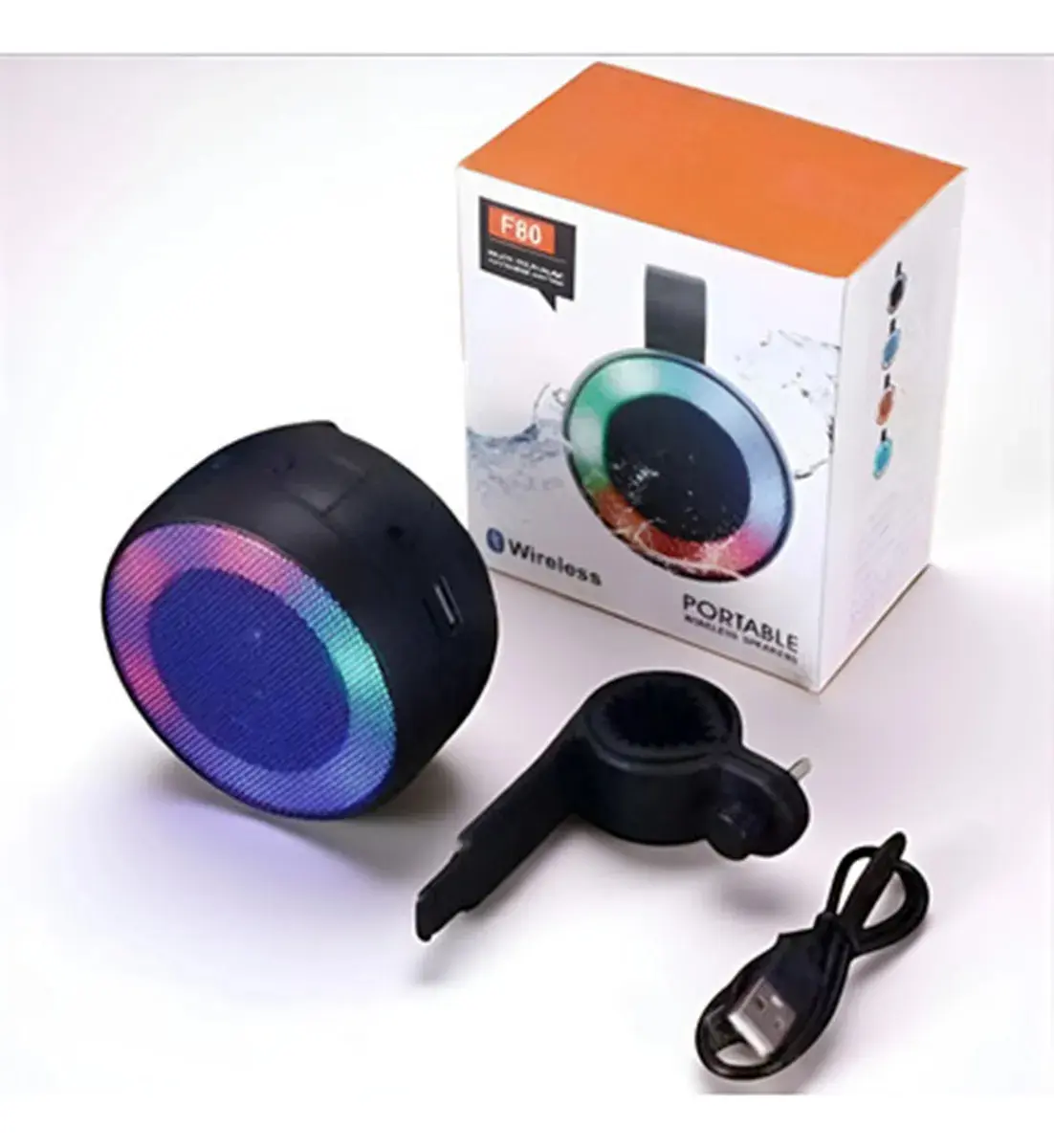 Parlante Bluetooth negro con luces LED RGB, accesorio de montaje para bicicleta, cable USB y caja de presentación.