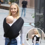 Mujer usando fular portabebés negro de viscosa elástica, con bebé en posición ergonómica; variante color negro visible en inserto circular.