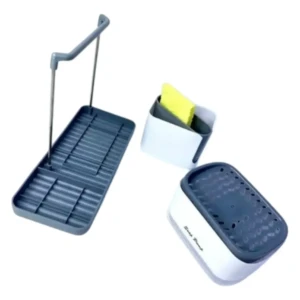 Dispensador de jabón 3 en 1 con secador al aire, color gris oscuro y blanco, mostrando base con ranuras para jabón, soporte vertical y contenedor con esponja amarilla.