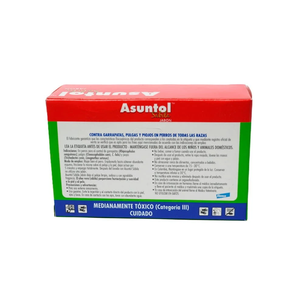 Caja de jabón Asuntol Sábila para perros, con etiqueta roja, verde y azul. Muestra instrucciones de uso, advertencias de toxicidad y símbolos de cuidado ambiental. Presentación rectangular con texto en español.