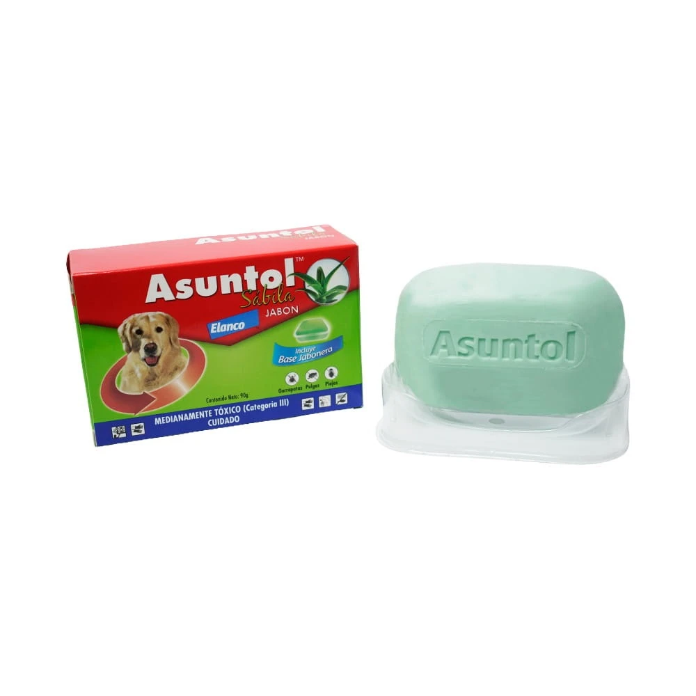 Jabón Asuntol Sábila para perros, color verde menta, con caja roja y verde mostrando perro y etiqueta de uso en baño.
