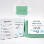 Jabón facial verde de Serum 10 con ácido salicílico y kójico, empaquetado en caja y barra individual, con etiqueta que indica limpieza detox y unificación del tono de piel.