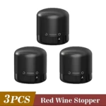 Set de tres tapas decorativas para botellas de vino, color negro mate, con diseño minimalista y detalles en blanco.