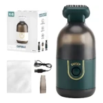 Aspiradora mini inalámbrica K-6 en verde oscuro con base translúcida, incluye caja, cargador USB, bolsa de tela y boquilla extra.