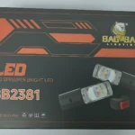 Packaging negro con detalles en naranja del kit de luces exploradoras Slim BB2381, mostrando dos unidades de luz LED y un interruptor rojo.