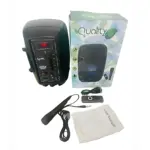 Cabina Bluetooth Q-602 de 8 pulgadas en negro, con panel de control frontal, micrófono inalámbrico, cargador y manual. Incluye caja de presentación.