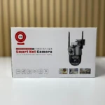 Cámara de seguridad Smart Net Camera en caja blanca con del dispositivo negro de doble lente y antenas, mostrando funciones como visión nocturna y monitoreo remoto.