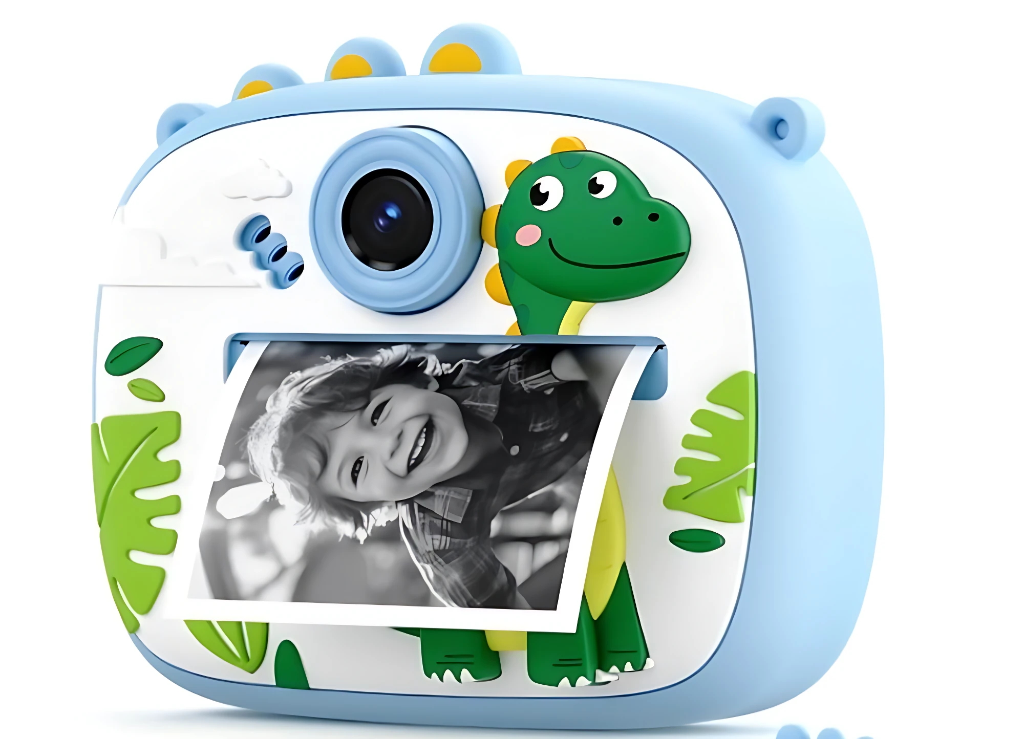 Cámara instantánea para niños en color azul claro con diseño de dinosaurio verde, lente frontal y salida de con impresa de un niño sonriendo.