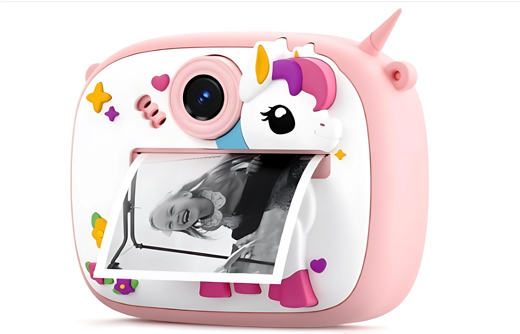 Cámara instantánea rosa con diseño de unicornio, mostrando impresa en salida frontal.