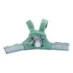 Arnés de seguridad moto para niños en color menta con estampado de conejo y hojas, diseñado para uso en motocicleta.