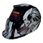 Careta de soldadura automática con diseño futurista en negro y plateado, visor digital con advertencia visible, ideal para trabajos intensos.