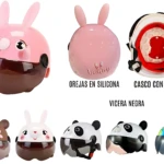 Casco infantil con visor oscuro y orejas de silicona en rosa, blanco y diseños de animales. Incluye correa de ajuste y visera negra.