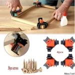 Cuatro clips de fijación angular para madera en color naranja y negro, mostrando su uso en ensamblaje de marcos y detalles de sus componentes.