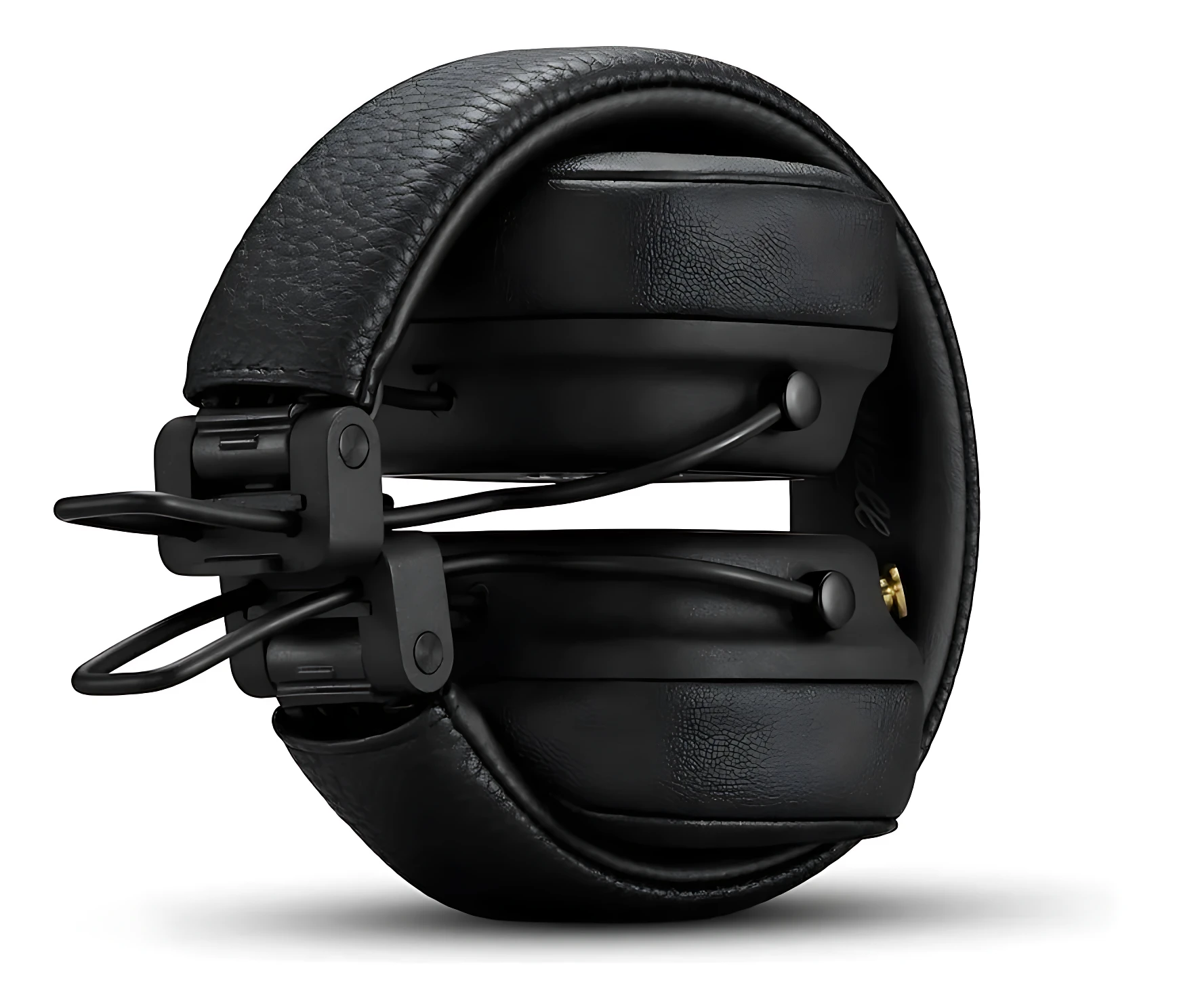 Diadema inalámbrica negra con cuero texturizado, vista lateral mostrando ajuste de orejeras y cable visible.