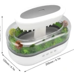 Difusor humidificador LED blanco con luz nocturna y sonido de lluvia, mostrando dimensiones de 205x120x155 mm y detalles internos con vegetación decorativa.