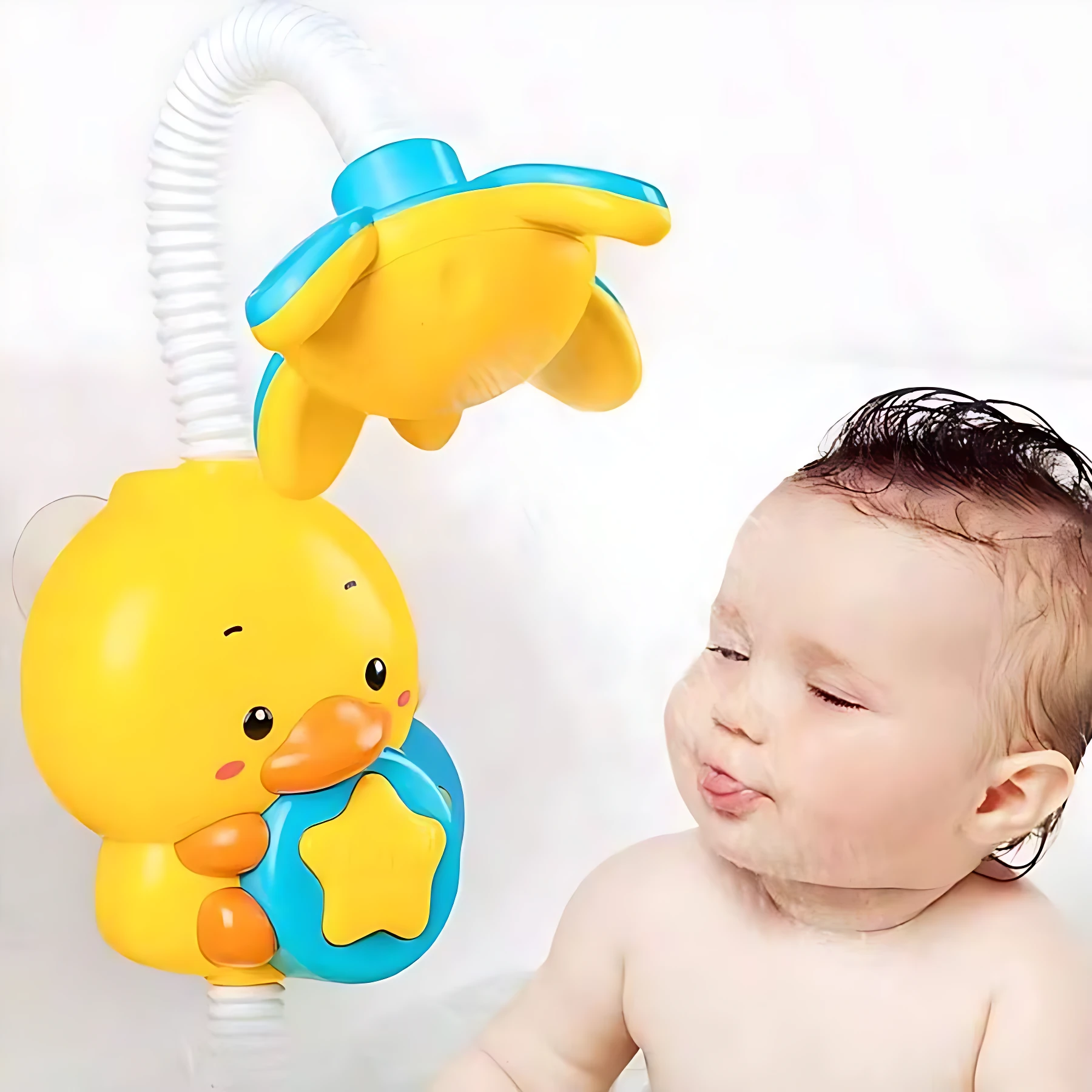 Ducha eléctrica de pato amarillo con bomba manual, accesorio para baño infantil que calma al bebé durante el aseo.