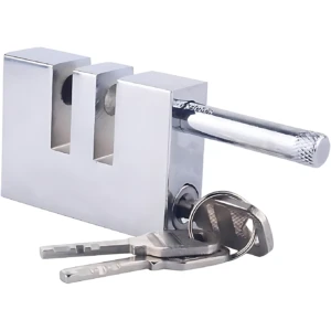 Seguro antirrobo para pedal de embrague y acelerador, fabricado en acero inoxidable con acabado cromado. Incluye llaves de seguridad.