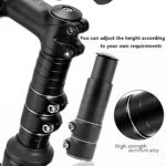Extensor de manubrio de aluminio negro, ajustable en altura con tornillos visibles y acabado mate, diseñado para reducir fatiga y mejorar postura al pedalear.