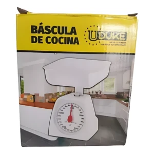 Báscula de cocina analógica blanca con dial de 0 a 5000 gramos, mostrador y caja amarilla con marca UDOKE.