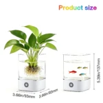 Dos recipientes de vidrio con base blanca: uno con planta hidropónica y otro como acuario con peces, ambos de 5.39 pulgadas de alto y 3.66 pulgadas de ancho.