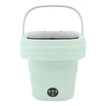 Lavadora portátil color menta con asa y panel de control frontal, diseñada para lavar hasta cuatro prendas íntimas en minutos.