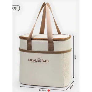 Lonchera térmica beige con asas de cuero sintético, medidas 24.5 x 16 x 23 cm, ideal para estudiantes y oficina.