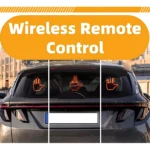 Mano LED trasera para auto, color negro con luces naranjas en forma de mano abierta y pulgar arriba, montada en ventana de vehículo.