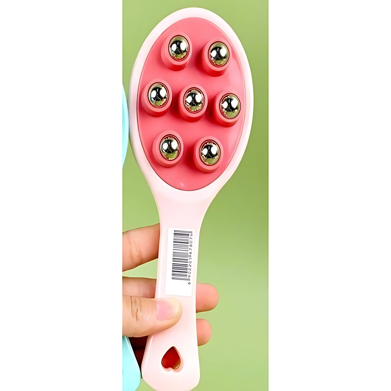 Masajeador manual con esferas metálicas, mango rosa y cabeza ovalada con seis bolas de acero inoxidable para aliviar tensión muscular.
