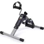 Bicicleta de ejercicio compacta en color negro y gris, con pantalla digital, manubrio ergonómico y base estable para entrenamiento en casa.