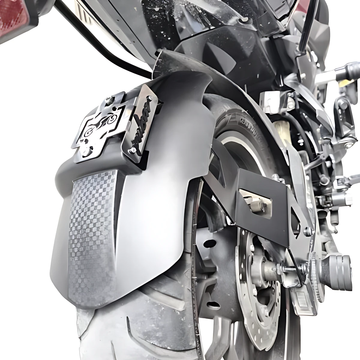 Monobrazo trasero de acero inoxidable mate instalado en motocicleta, con acabado texturizado y soporte metálico visible.