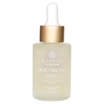 Bote de vidrio con gotero dorado, contenido en aceite facial de color crema pálido, con etiqueta que indica "Oleo Facial" y detalles del producto.