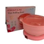 Olla eléctrica para cera depilatoria en color rosa, con tapa transparente y base con interruptor. Incluye caja de presentación con ilustraciones del producto. Modelo CL-2208.