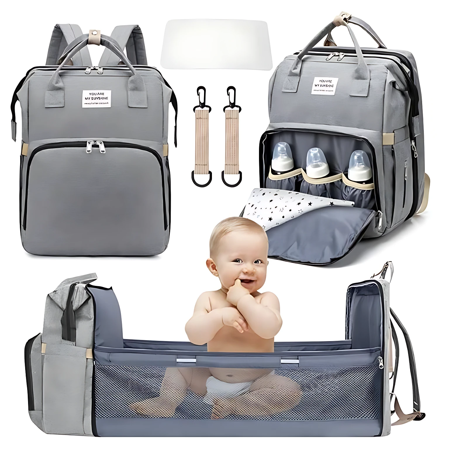 Pañalera morral gris con cambiador integrado, incluye organizador de biberones, pañales y accesorios para bebé.