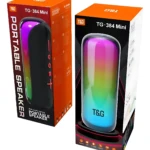 Pack de dos parlantes Bluetooth portátiles T&G modelo TG-384 Mini, con carcasa negra y luces RGB dinámicas en tonos arcoíris, presentados en cajas naranjas y negras.