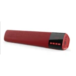 Barra de sonido B28 en color rojo con panel negro, controles táctiles y puerto USB visible, diseñada para audio inmersivo con graves potentes.