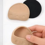 Plantilla puntera invisible en tonos piel y negro, con diseño ergonómico y superficie texturizada para aliviar presión en la punta del pie.
