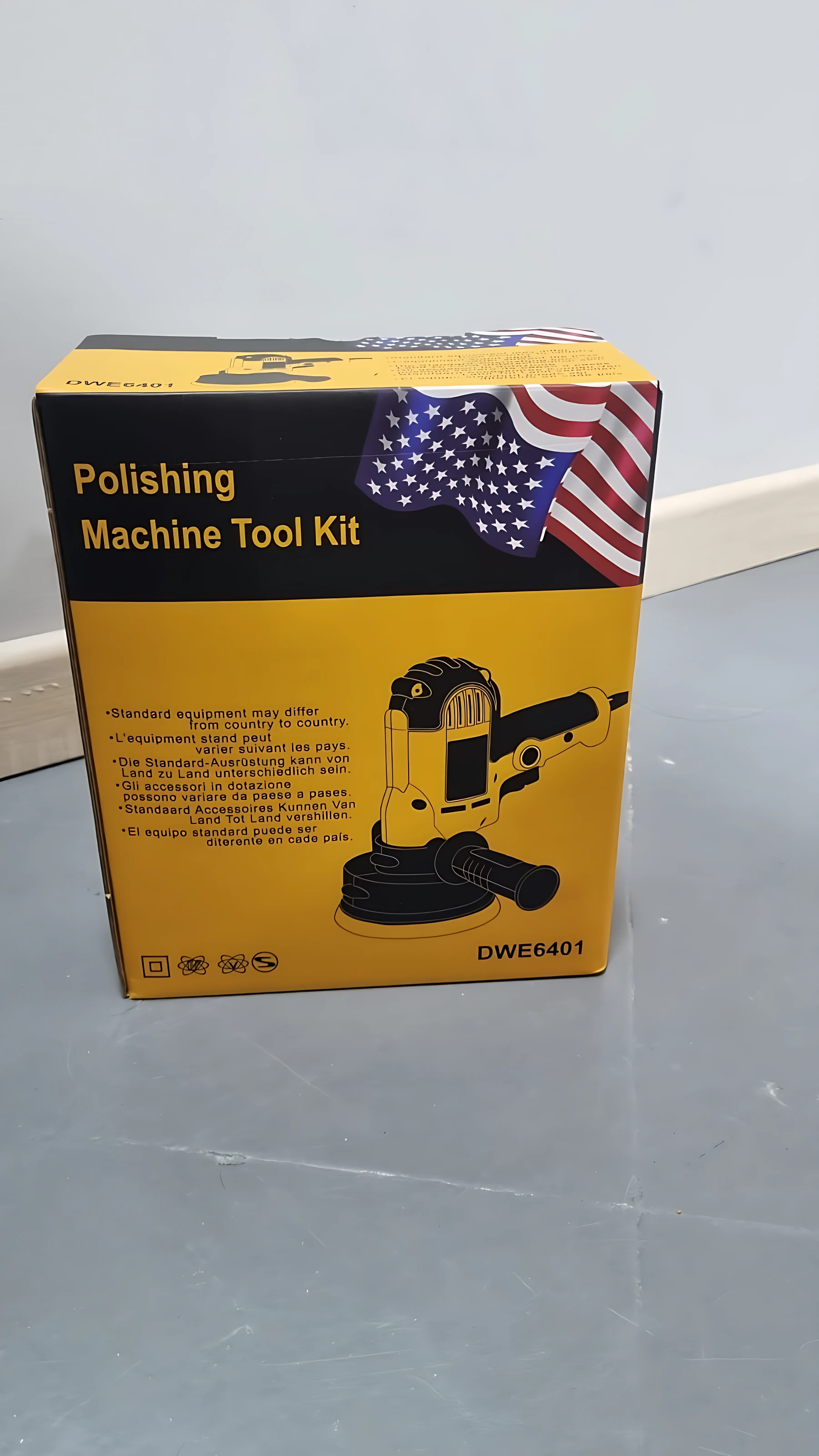 Caja amarilla del kit de pulido Dewalt DWE6401 con bandera estadounidense, mostrando la herramienta en su empaque.